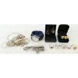 A collection of costume jewellery to include rings, bracelets,