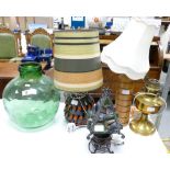 A mixed collection of items: Items to include table lamps, oil lamps, glass bottles etc.