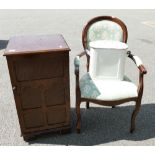 Dark Oak record cabinet together with an upholstered arm chair & enamelled bread bin.