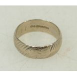 9ct white gold wedding band: 9ct white gold wedding ring size N, 4.1 grams.