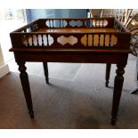 Modern Mahogany gallery topped serving table: Table with leather clad surface, 55 x 64 x 62 height.