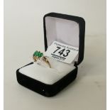 9ct ladies ring: 9ct ring set with three semi precious green stones, size R, .2.2 grams.