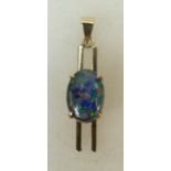 10ct gold Opal style pendant: Pendant stamped 10K gold, set with doublet style opal, 4.1 grams.