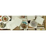 A large collection of collectors wall plates: with varying themes and manufacturer's ( 4 large