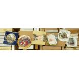 A large collection of collectors wall plates: with varying themes and manufacturer's ( 4 large