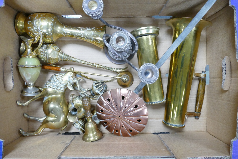 A collection of brass and metal ware items including: trench art vases, decorative oak handled jug,
