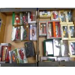 A large collection of boxed Dinky & Corgi model vehicles: cars & buses of the 1960's(2 trays)