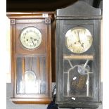 Two cased 1930's wall clocks: in need of repair(2)