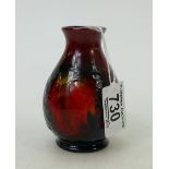 Moorcroft small flambe vase: Moorcroft 1950s small flambe vase decorated in the leaf and berry