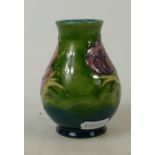 Moorcroft Clematus on green goubnd small vase: height 9.