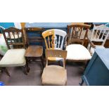 A collection of vintage chairs.