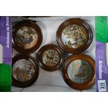 A collection of Prattware circular pot lids in oak frames: Pot lids comprising - Hide and Seek,