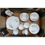 Royal Albert Tea ware: decorated with white flowers to include cups, saucers,