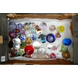 A Collection of glass paperweights: to include Caithness, Murano, Millefiori.