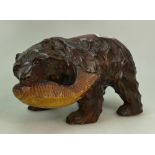Carved Wooden Black forest Bear: holding a fish in his mouth