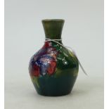 Moorcroft small vase: Moorcroft 1950s small vase decorated in the hibiscus design,height 9.5cm.