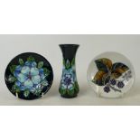 A collection of Moorcroft items to include: small floral decorated vase,