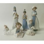 A collection of LLadro & Nao figures to include: Nao Child with puppy, Nao Girl with Puppy,