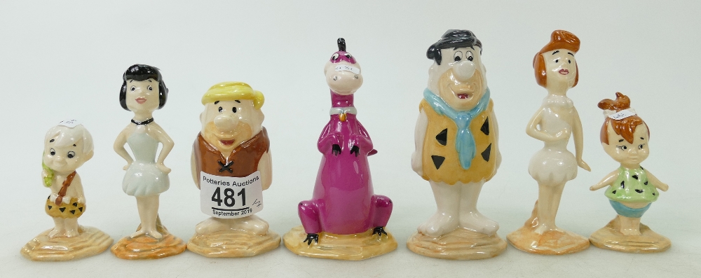 A collection Beswick Flintstones figures: Fred and Wilma, Pebbles Flinstone, Barney and Betty,