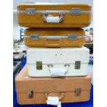 A collection of 4 vintage suitcases: browns and cream in colour(4)