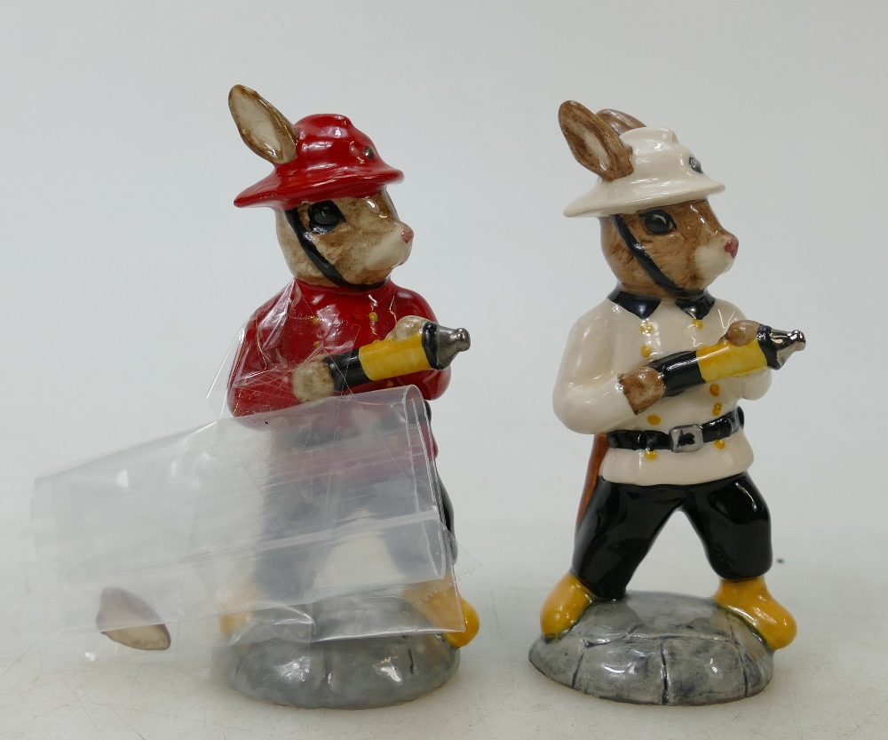 Two Royal Doulton Bunnykins Fireman DB183: Two Fireman figures in different colourways (one white