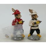 Two Royal Doulton Bunnykins Fireman DB183: Two Fireman figures in different colourways (one white