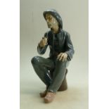 Large Nao Figure of Fisherman: Figure seated smoking a pipe height 38cm.