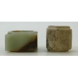 Two Neolithic style Jade Congs: A pale green jade with brown textured Cong and a small plain
