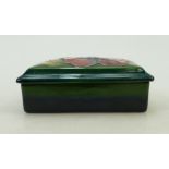 Walter Moorcroft oblong Box and cover: Moorcroft box decorated in the Hibiscus design, length 13cm.