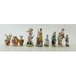 A collection of continental porcelain figures: Meissen style porcelain figures including miniature