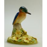 Royal Doulton model of Kingfisher: Mounted on a floral base dated 1923, height 12cm.
