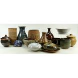 A collection Mid Century Art Pottery items to include: Lidded pots, vases,
