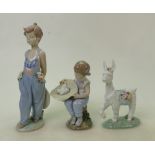 Lladro figures: A Lladro Parading Donkey 6573 together with What a surprise 6759 and Pocket full of