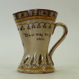 Motto ware Jug: Torquay ware style early motto jug "Be as easy as you can", height 14cm.