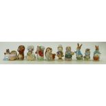 A collection of Beswick Beatrix Potter figures: Beswick gold marked Beatrix Potter figures