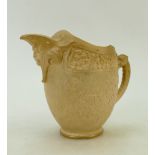 Doulton Burslem Jug: Doulton Burslem ewer decorated all around with flowers and mask head to spout,