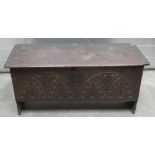 17th Century Oak Coffer: With Carved decoration to front panel, plank sided, length 131,