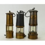 A collection of Brass Miners / Safety Lamps to include: E Thomas & Williams GPO item,