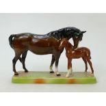Beswick Mare and Foal on base: Beswick brown mare with Chestnut foal on ceramic grass base model