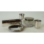 A collection of silver items including: Ornate mirror, silver topped jar,