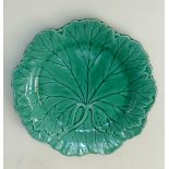 A Wedgwood Norman Wilson Plate: Moulded in natural leaf foliage, with a green Majolica glaze,