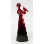 Royal Doulton Flambe prototype Images: Figure of woman holding a dove, height 21cm.