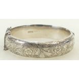 Silver hallmarked Bangle: Hallmarked silver bangle, Internal dimensions 60mm x 57mm, x 16mm deep.