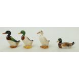 Royal Doulton collection of miniature Ducks: Royal Doulton Mallard swimming HN2572, standing HN807,