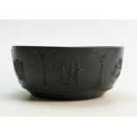 A Wedgwood Black Basalt Bowl: Decorated with Neo Classical scenes, circa 1920. 22.5cm in diameter.