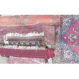 A collection of six hand woven Rugs in various sizes (6):