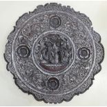 A 19th Century Burmese circular carved wall plaque: A 19th Century Burmese circular carved wall