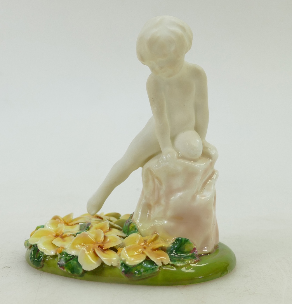 Royal Doulton figure A Saucy Nymph HN1539: In white colourway mounted on a floral base, dated 1938.