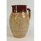 Doulton Lambeth Stoneware Jug: Doulton Lambeth Stoneware comical drinking gauge jug, height 24cm.