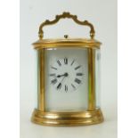 Carriage Clock hour repeating & striking hour & half: Larger oval cased French carriage clock.